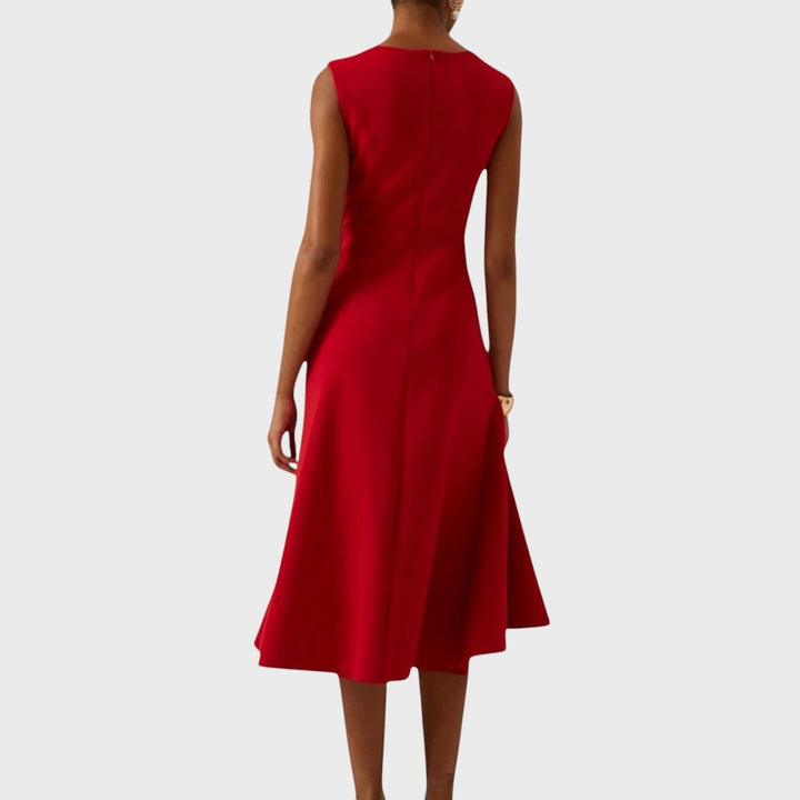 Катарина - Стилна асиметрична миди рокля за всякакви поводи